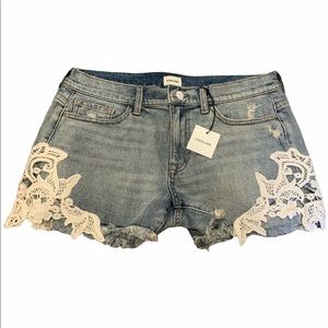Sneak peek blue jean shorts with lace accent